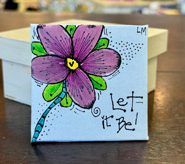 purple flower with the words "let it be"