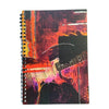 Notebook with a guitar design on a colorful abstract background