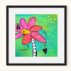 Framed artwork of a colorful flower on a green - blue background.