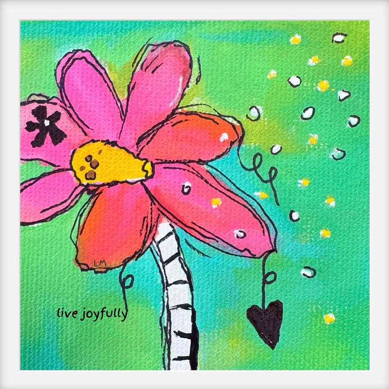 Colorful art print of pink flower with a small heart on a green-blue background, featuring the text 'live joyfully'