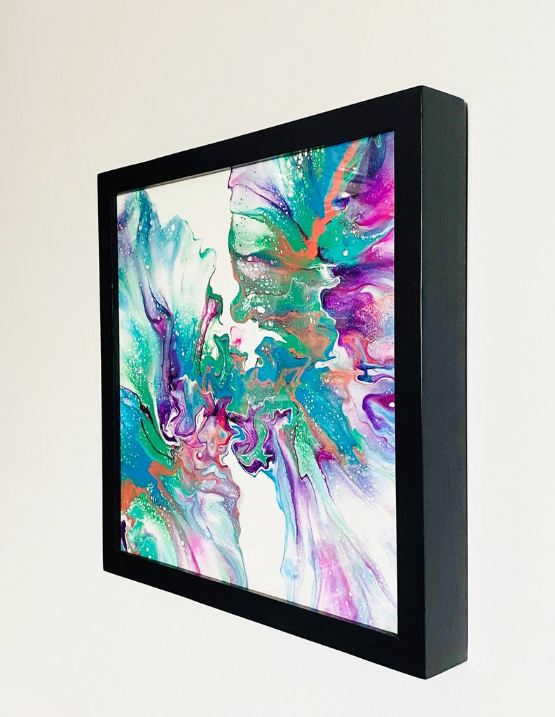 multicolor fluid art painting on canvas with black frame