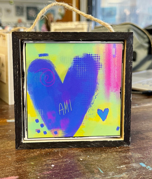 Framed tile art with colorful heart and letters AMI for Anna Maria Island