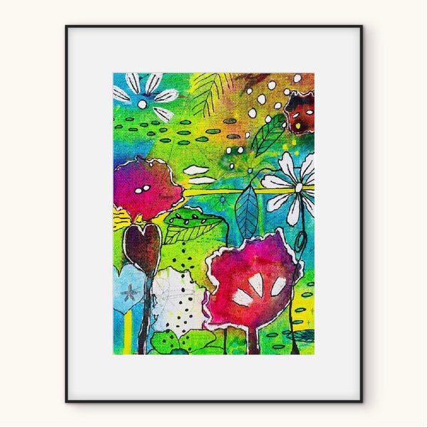 Framed colorful abstract art with flowers and leaves on a white background