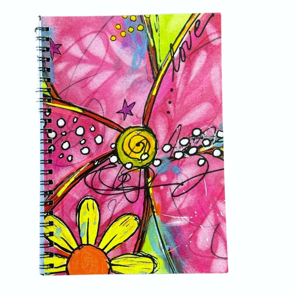 Colorful notebook with abstract design on a white background