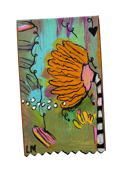 small painting with whimsical artwork and colorful flower theme