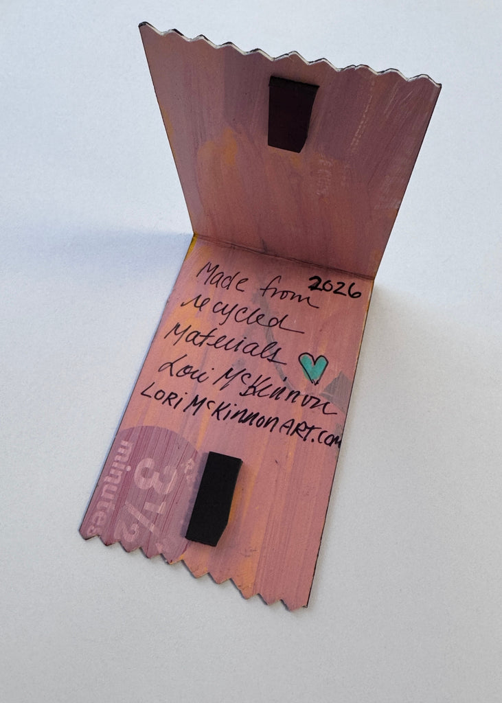 inside view of painted bookmark with small magnets for closure