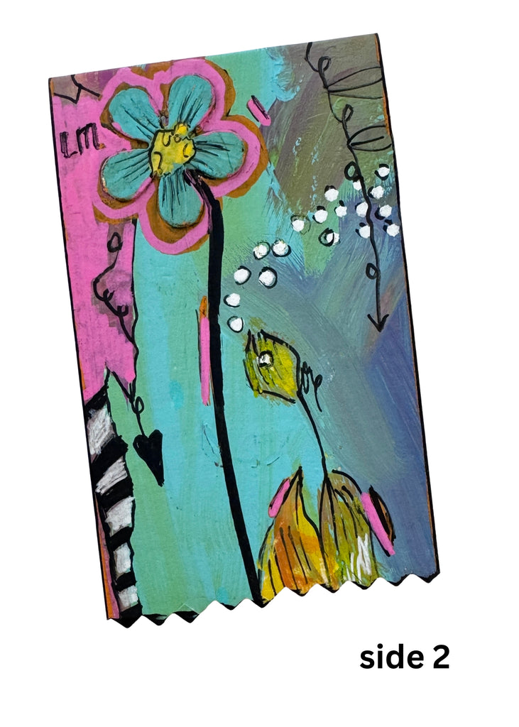 small painting with whimsical artwork and colorful flower theme