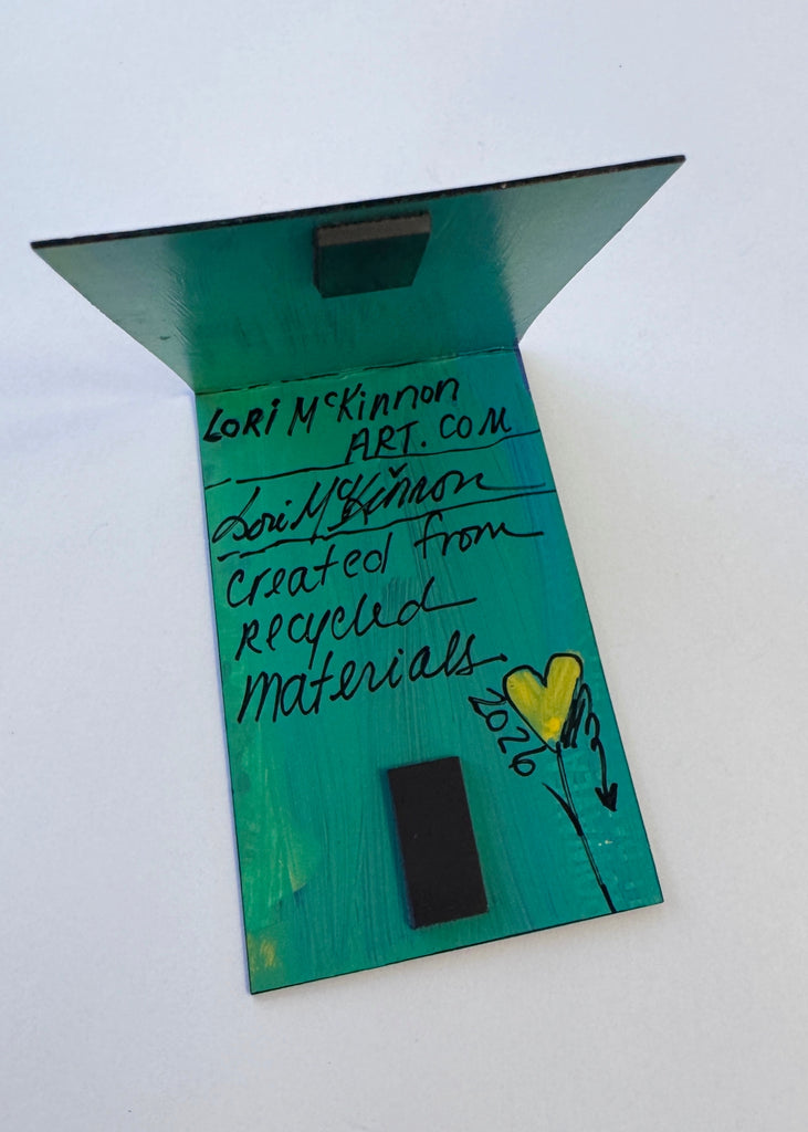 artist signature inside a magnetic bookmark
