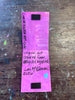 A handmade art piece made from recycled cardboard, painted in vibrant magenta pink with black magnetic mounting pieces at the top and bottom. Handwritten text in black marker details the artist, Lori McKinnon Art
