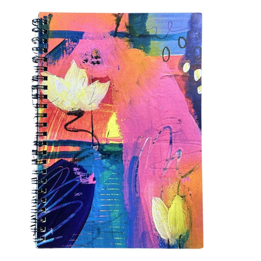 Colorful abstract notebook with floral design on a white background