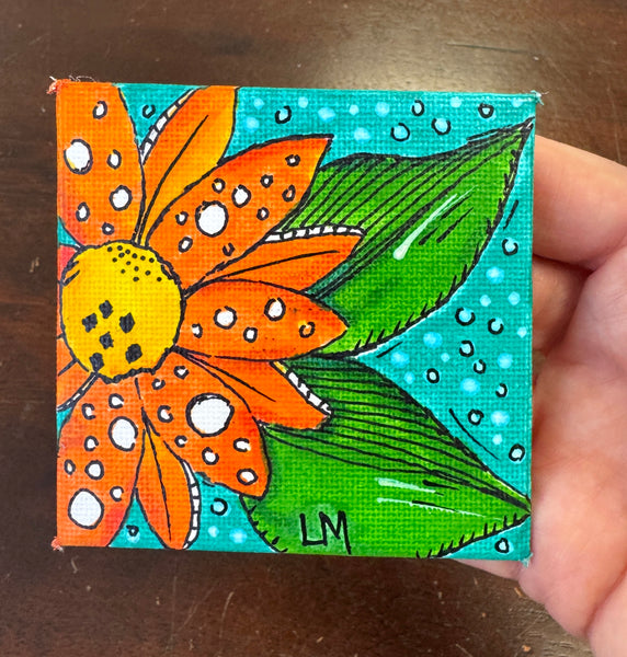 orange flower artwork on 3 inch canvas magnet