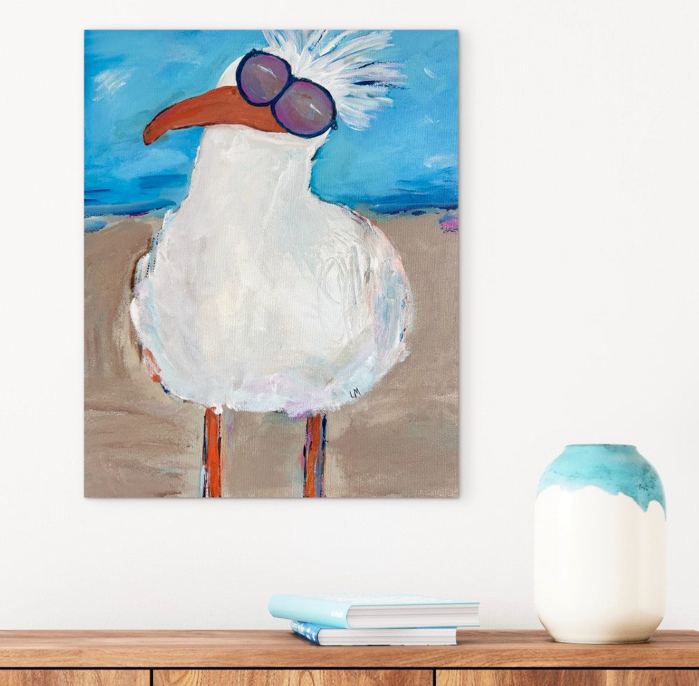 Painting of a bird with sunglasses on a wall above a table with a vase