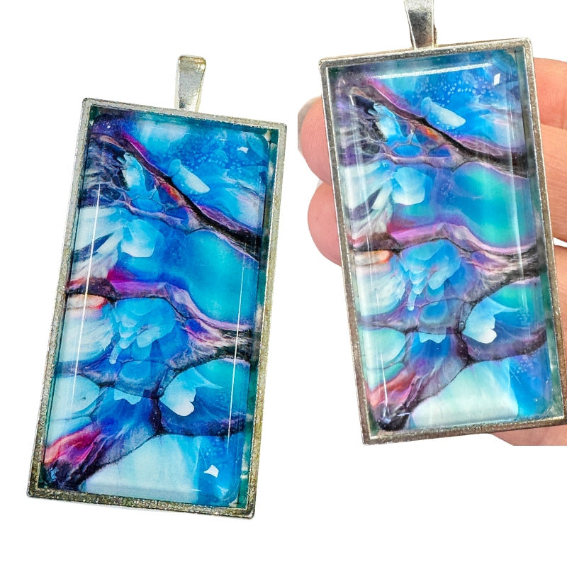 painted glass pendant in silver tray setting with bail
