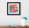 Sample of art print of a colorful palm tree on a pink background