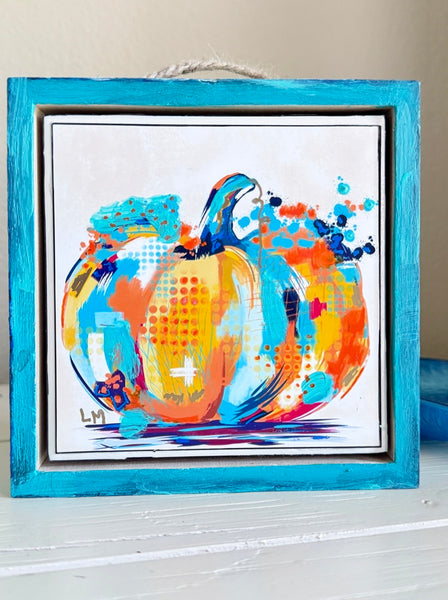 pumpkin artwork in a 5x5 wood frame that can stand alone or hang on a wall