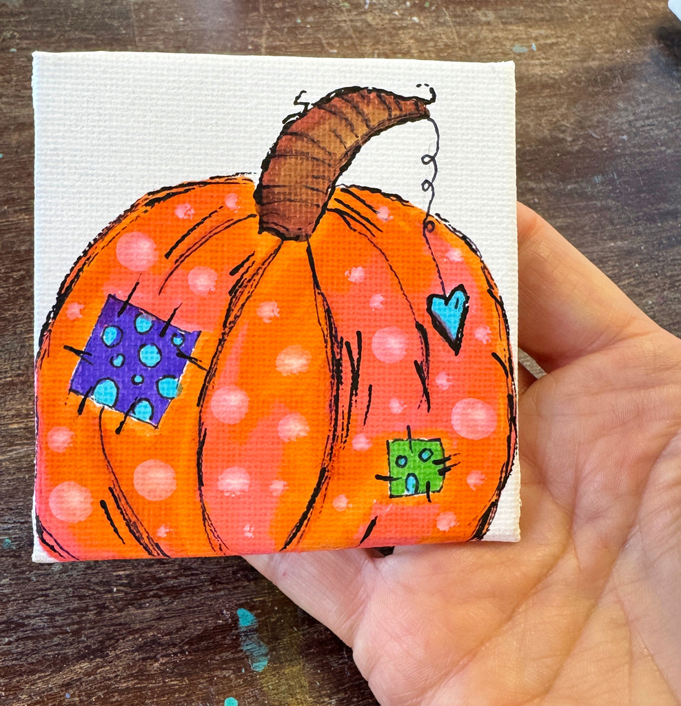 colorful pumpkin artwork on canvas panel