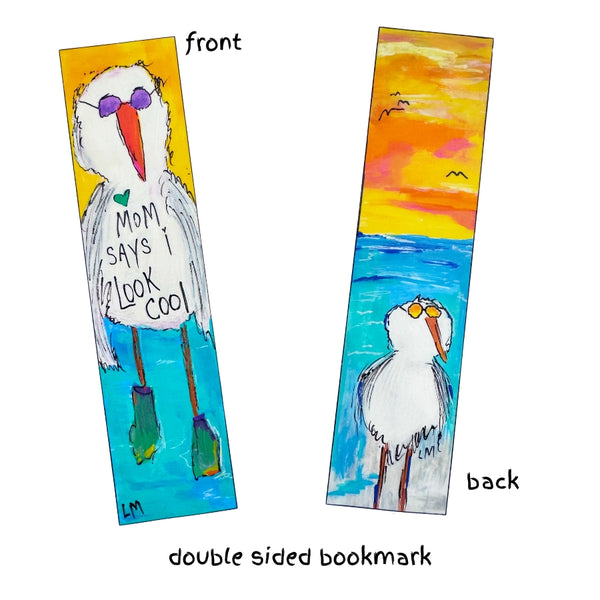 Double-sided bookmark featuring whimsical seagulls. The front side shows a white bird with purple sunglasses and the text 'MOM SAYS I LOOK COOL' against a yellow and blue background. Initialed by artist