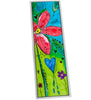 A colorful laminated bookmark featuring a whimsical hand-drawn flower scene with a large pink-red flower, green leaves, a blue heart, and the word 'love' on a white background.
