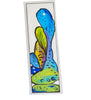 A rectangular abstract art bookmark featuring layered organic shapes in bright blue, green, yellow, and purple on a white background, photographed against a light gray backdrop.