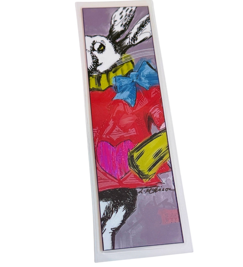 abstract art bookmark that has been laminated laying on a white table