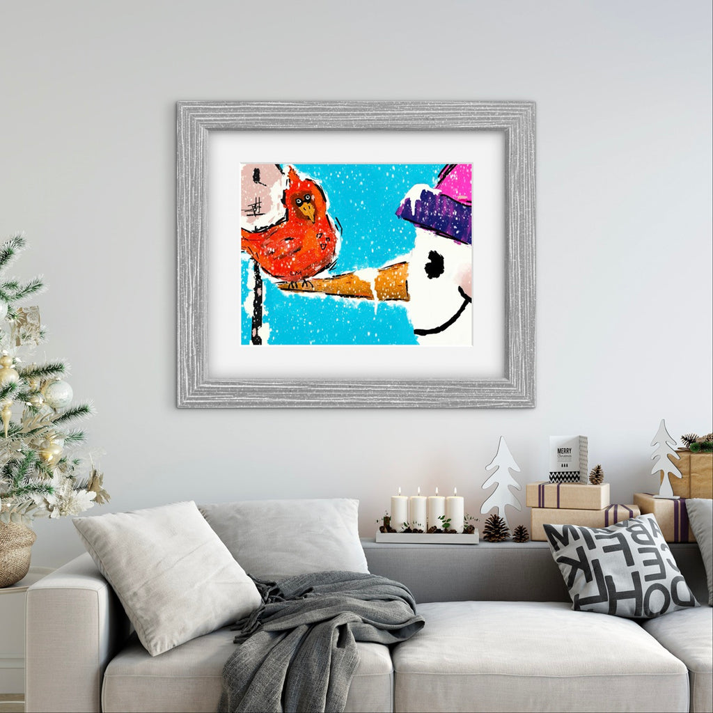 Framed artwork of a snowman and cardinal on a wall above a sofa with Christmas decorations.