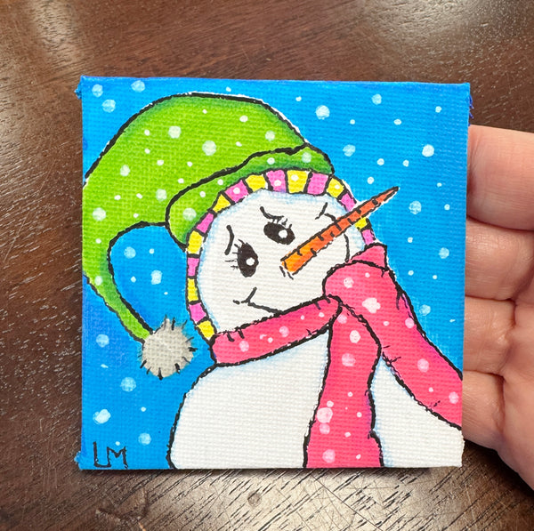 whimsical snowman with blue background on a 3x3 magnet