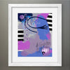 Framed abstract art print with colorful brush strokes on a gray wall
