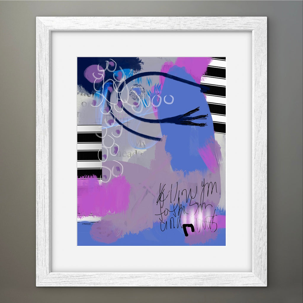 Framed abstract art print with colorful brush strokes on a gray wall