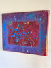"Love" text abstract painting on a white wall