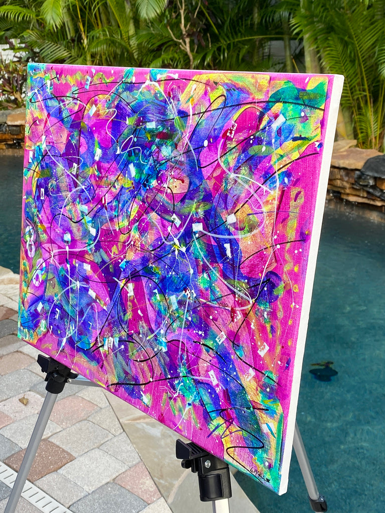Colorful abstract painting in pink, purple, blue and yellow. 